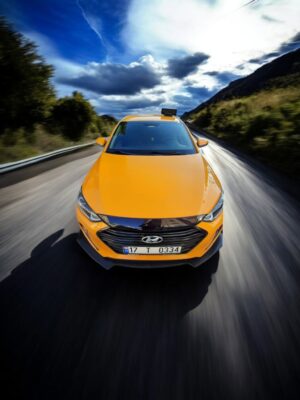 The 2020 ford fusion is shown in motion.